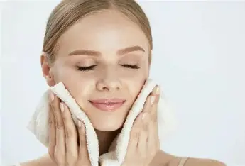 Completed bridal makeup with luminous skin, defined features and natural yet glamorous finish in professional salon setting