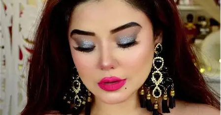 Close-up of expertly applied bridal makeup with warm tones and contoured cheeks demonstrating professional salon quality